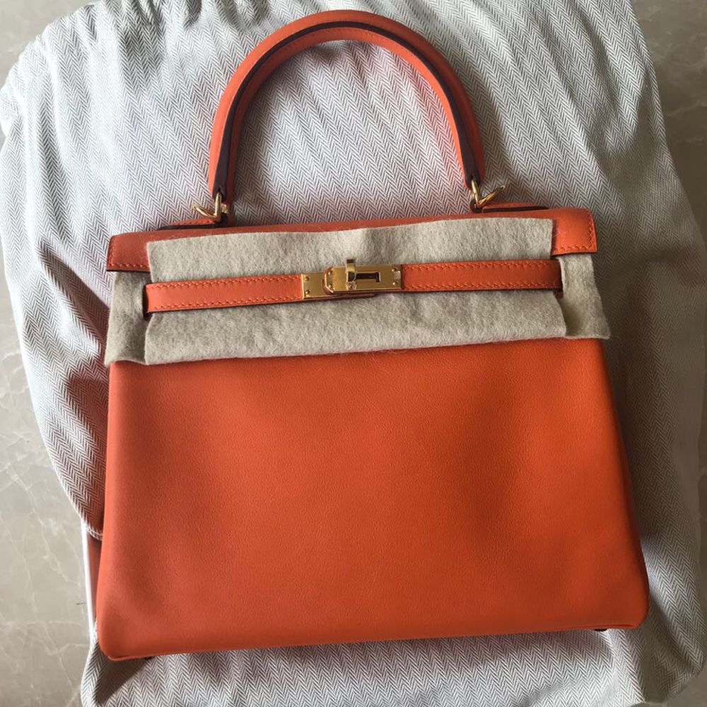 100% Authentic Hermes Kelly 25 Swift Orange PHW Condition 9/10 Comes with  Dustbag Lockset and Clochette, Luxury, Bags & Wallets on Carousell