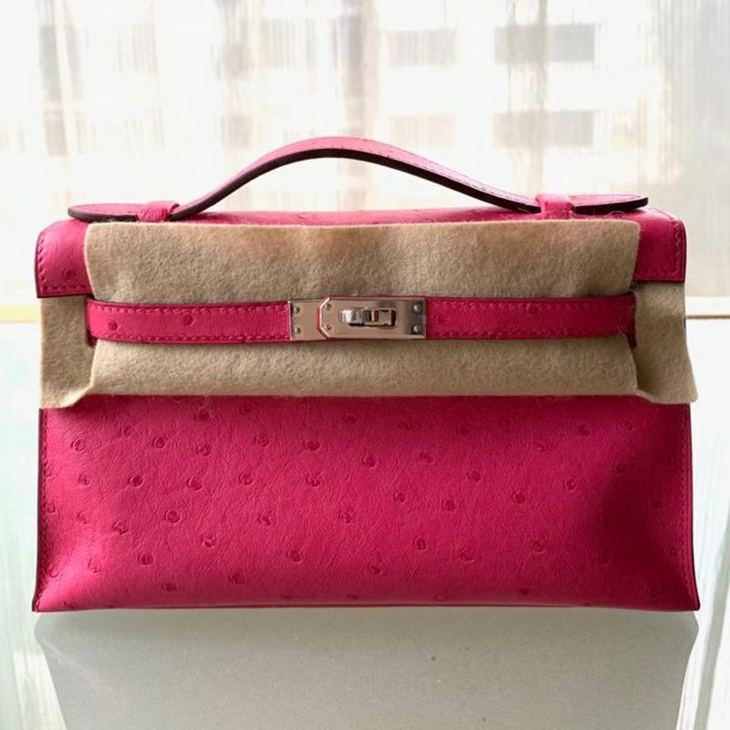 Hermès Kelly Pochette Rose Tyrien Ostrich Palladium Hardware PHW