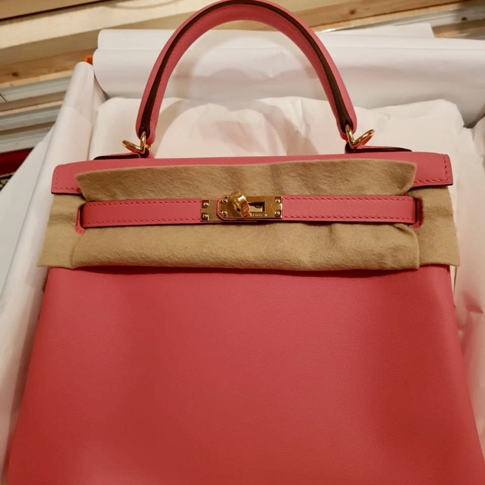 HERMÈS, ROSE AZALEE RETOURNE KELLY 25CM OF SWIFT LEATHER WITH GOLD  HARDWARE, Handbags & Accessories, 2020