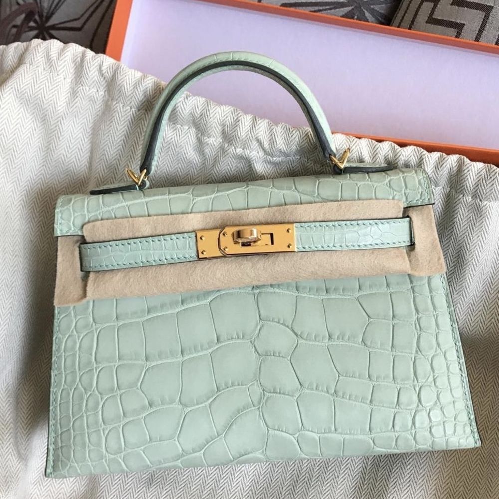 THE LUXURY SHOPPER™ on Instagram: “Hermès Kelly 20cm Vert Cypress Shiny  alligator with Gold hardware 😍 On the hunt for your next b…