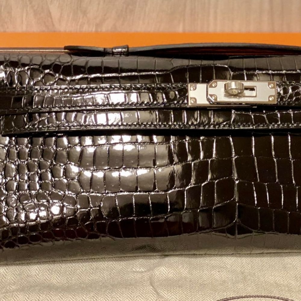 Hermès Kelly Cut Noir (Black) Crocodile Porosus Lisse Palladium Hardware PHW